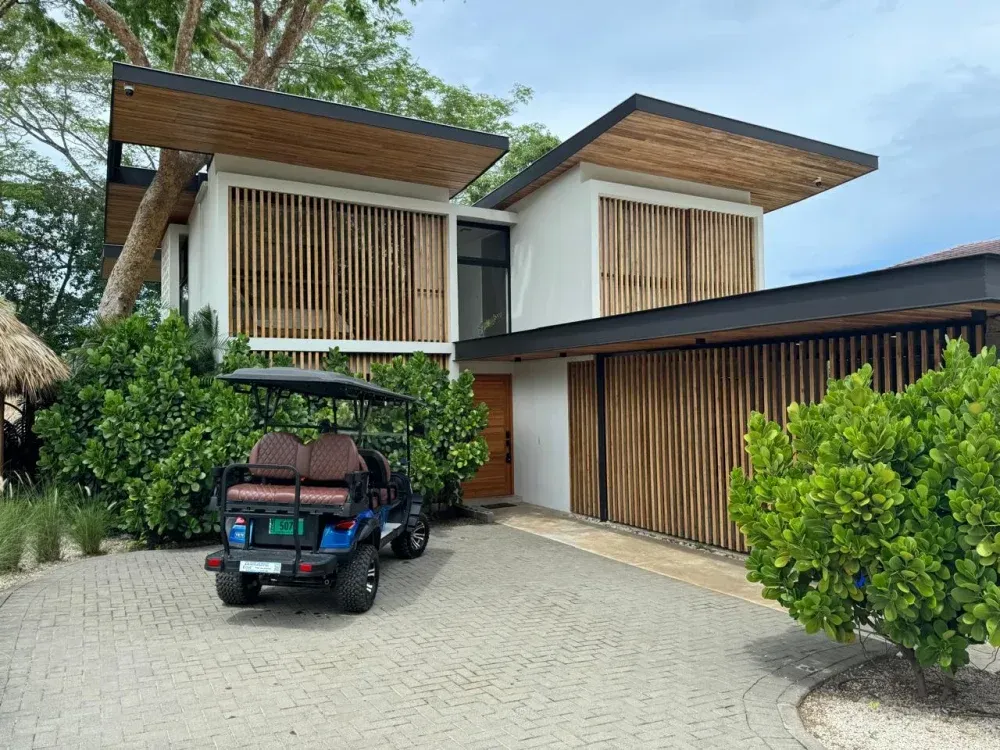 Golf cart delivered to a villa driveway in Playa Grande, Guanacaste